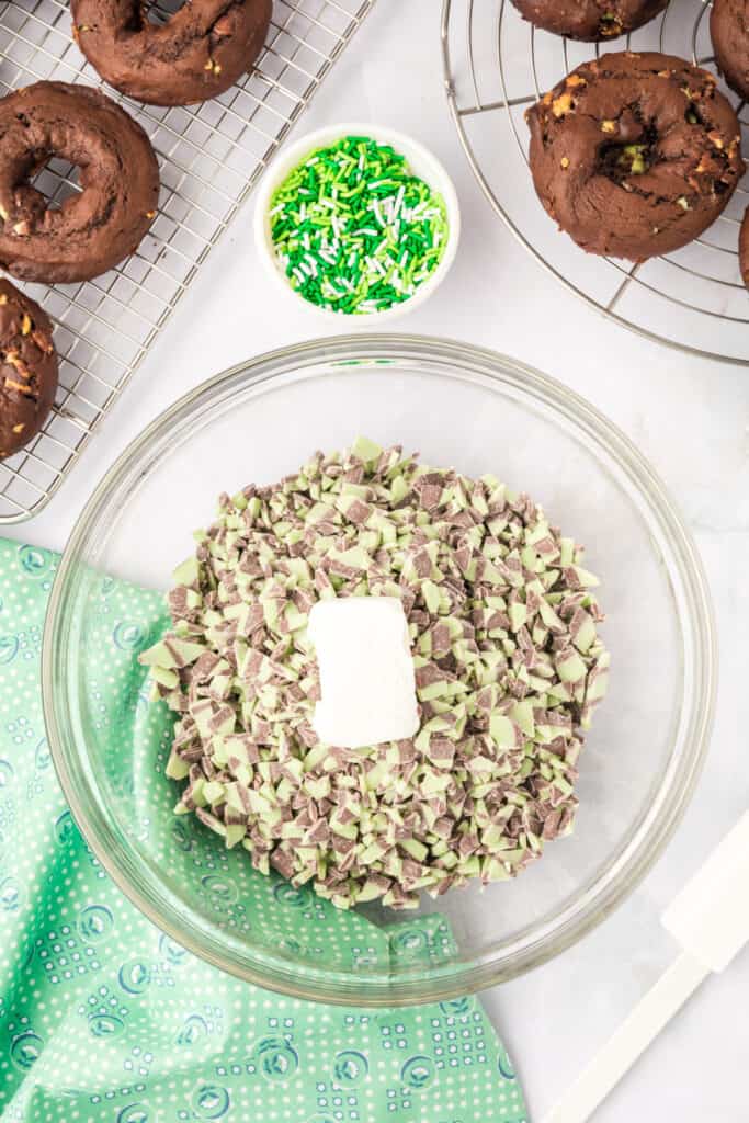 Andes Mint Baking Chips melting in a bowl for the Chocolate Mint Donut coating
