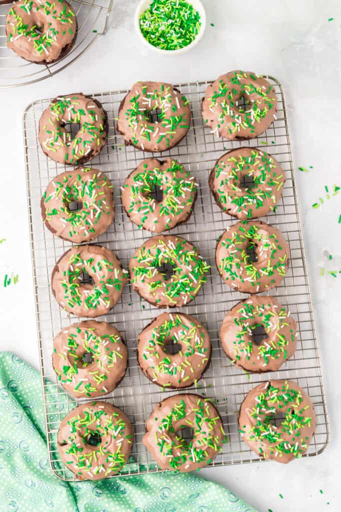 Chocolate Mint Donuts dipped in mint chocolate and decorated with green sprinkles