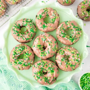 Chocolate Mint Donuts with mint chocolate coating and green sprinkles on a serving platter