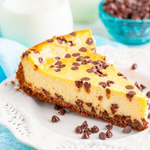 chocolate chip cheesecake slice on white plate