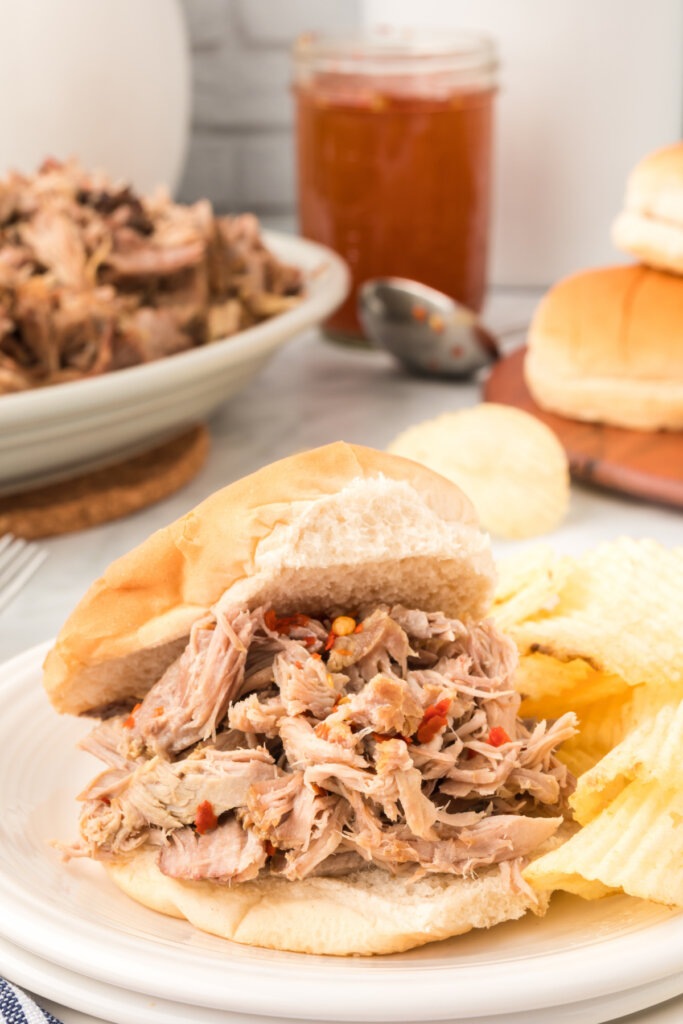 eastern nc slow cooker pork and bbq sauce on hamburger bun