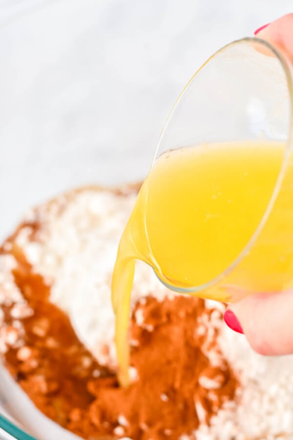 melted butter being added to bowl