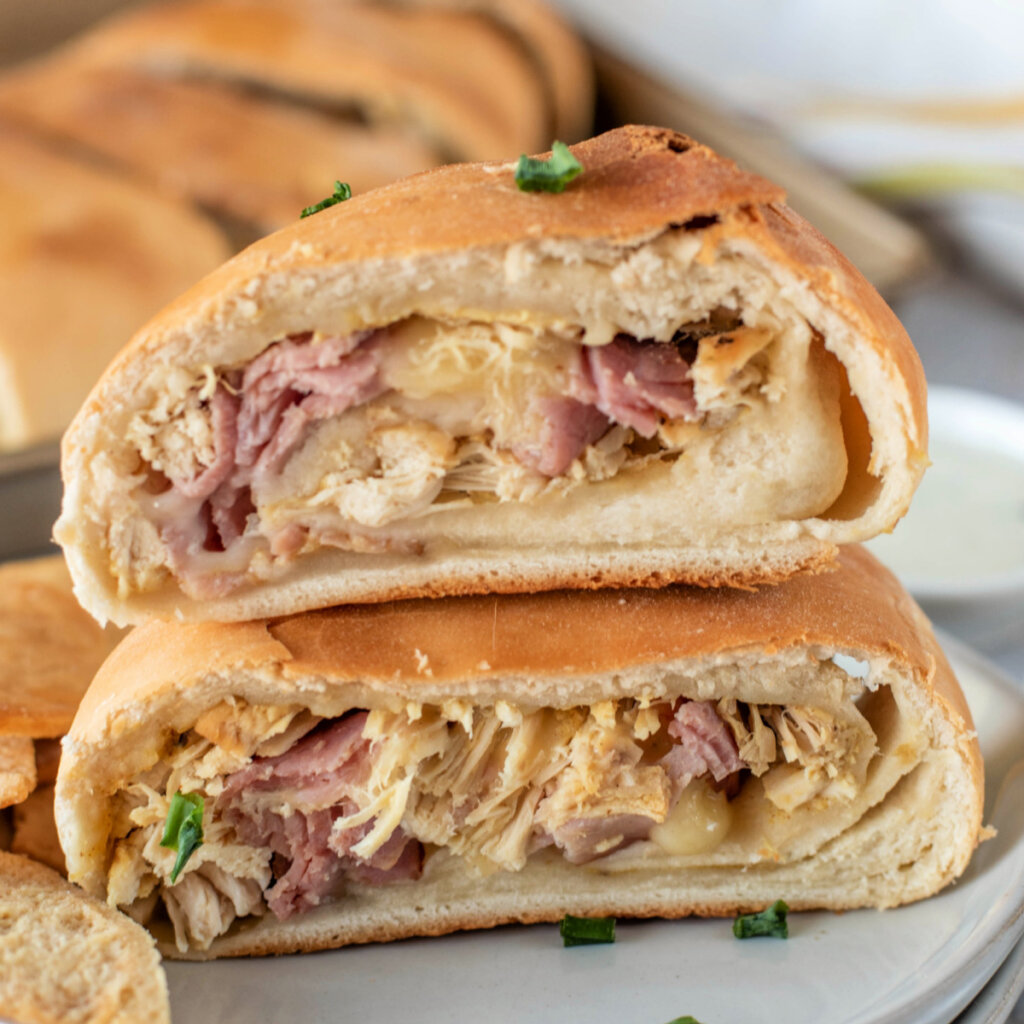 chicken cordon bleu stromboli slices stacked on top of each other