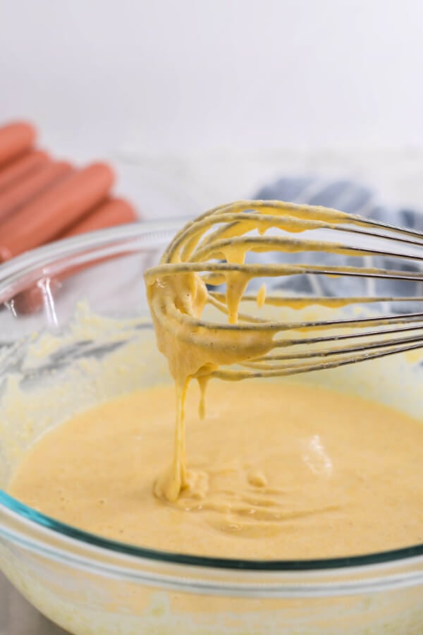 mixing the batter with a whisk