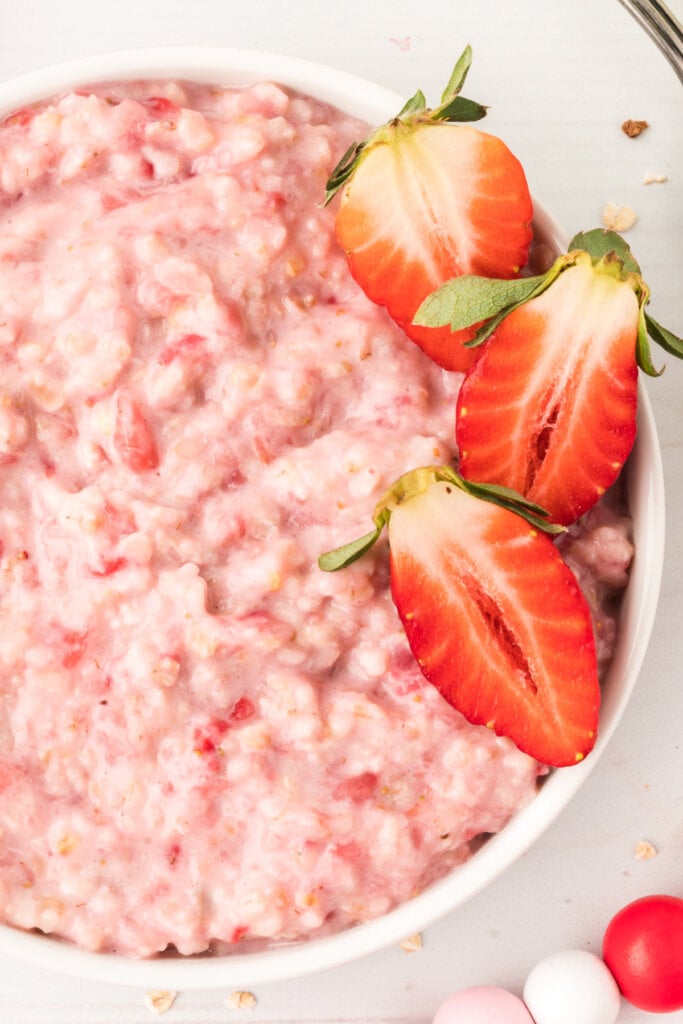 closeup bowl of strawberries and cream oatmeal