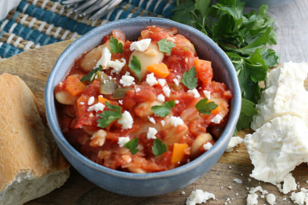 Greek Baked Beans in blue bowl