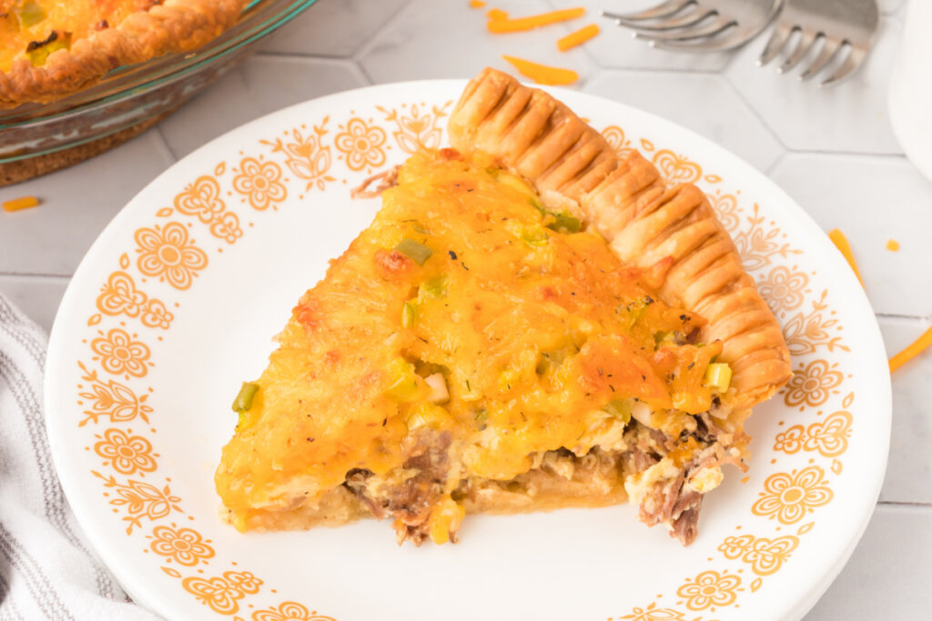 roast beef quiche slice on plate