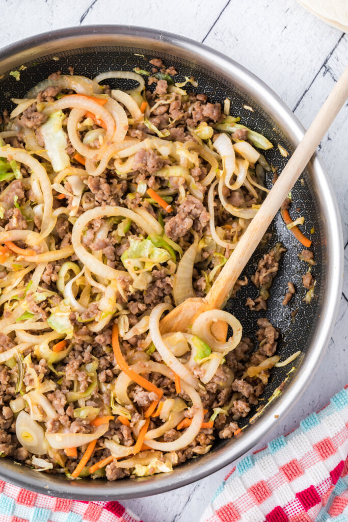 filling for asian burrito in skillet