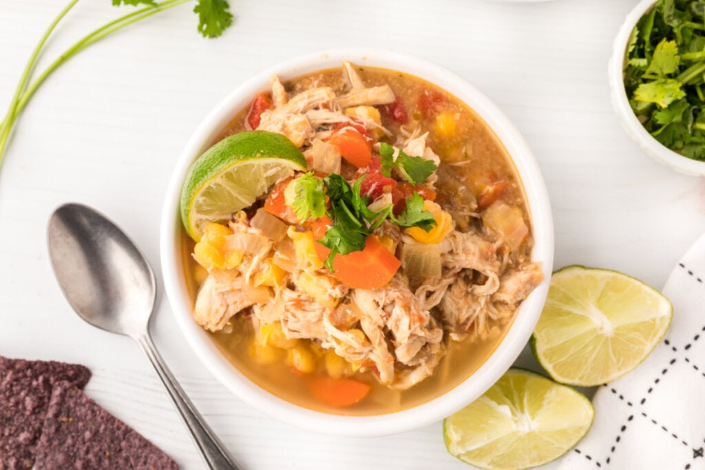 looking down into a bowl of slow cooker chicken posole