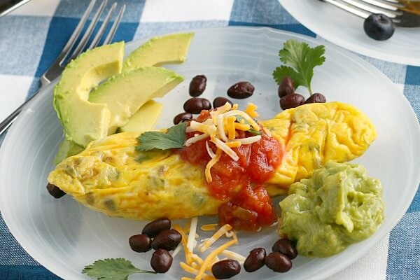 ziploc omelet on plate with garnish