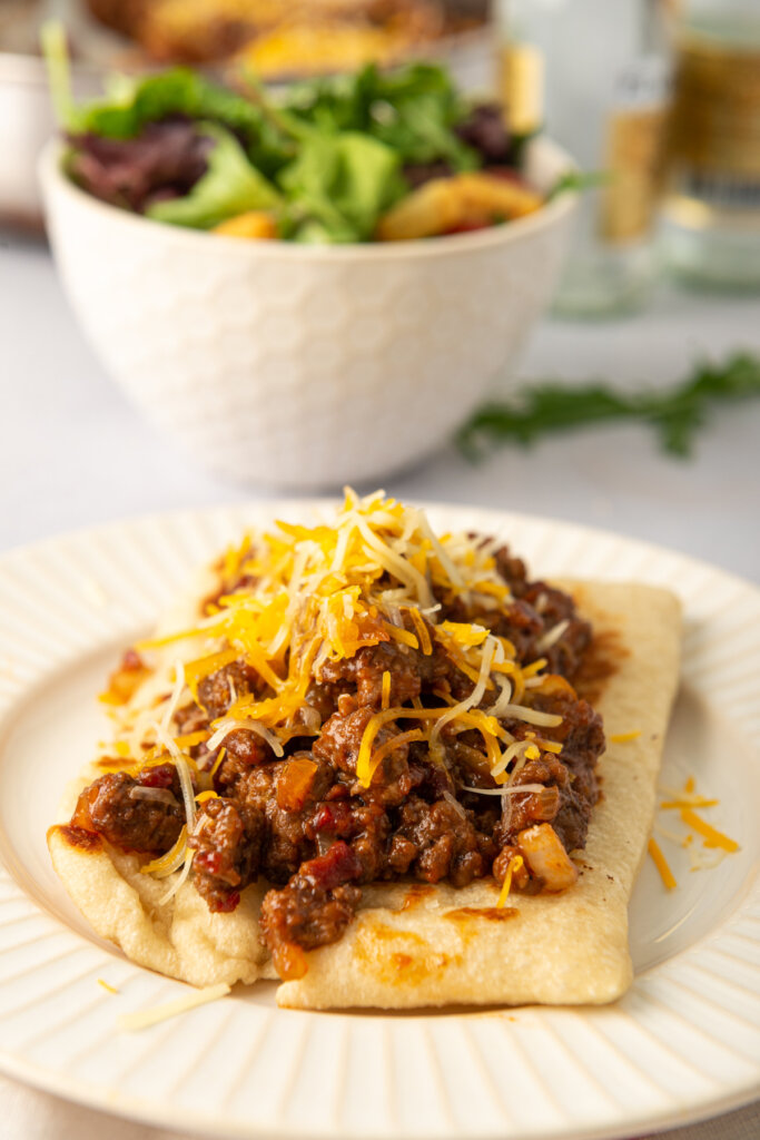 bbq bacon cheeseburger flat bread melts on plate