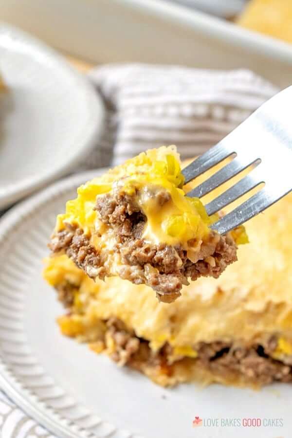 White Castle Casserole piece on a fork close up.