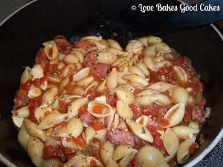 One-Pot Chicken and Sausage Pastalaya in a skillet.