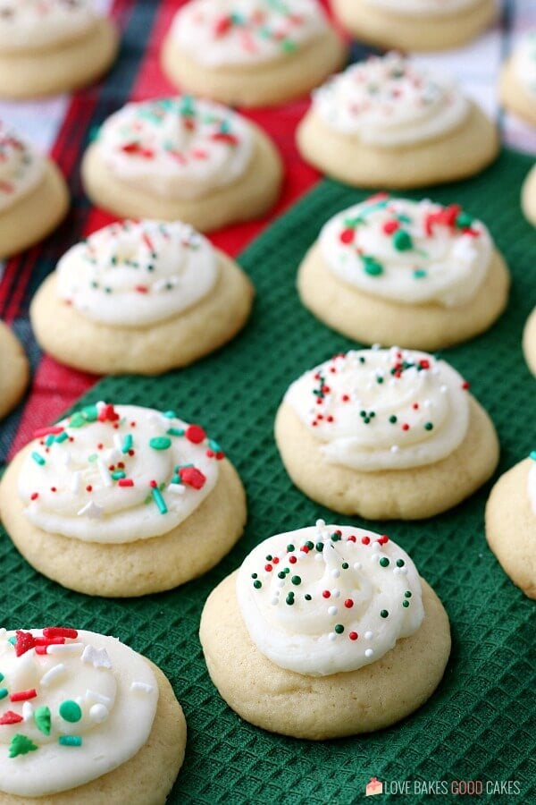 Soft Sugar Cookies laying on a cloth surface.