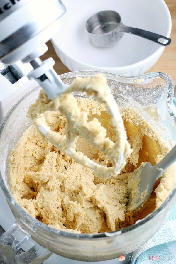 Soft Sugar Cookie dough in an electric mixer bowl after being blended.