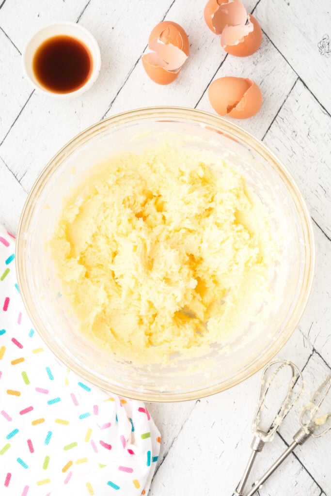 All eggs combined into the creamed mixture creating a smooth cookie dough base.