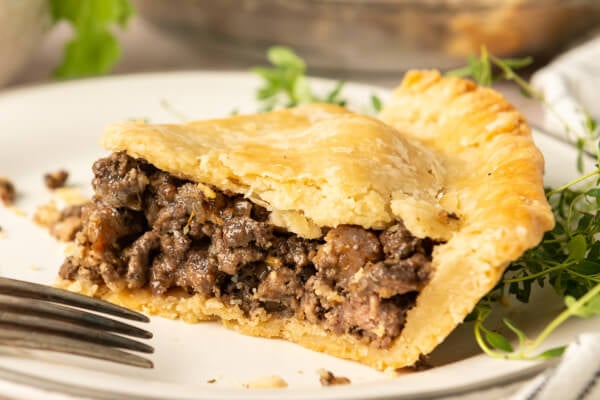 meat pie slice on plate