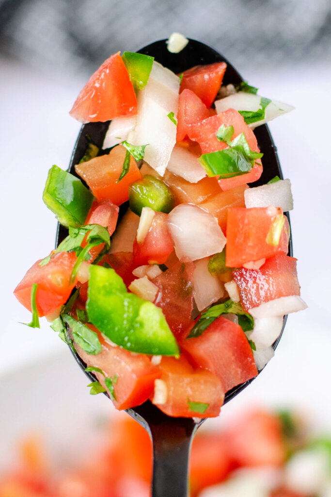 salsa fresca - pico de gallo - on spoon