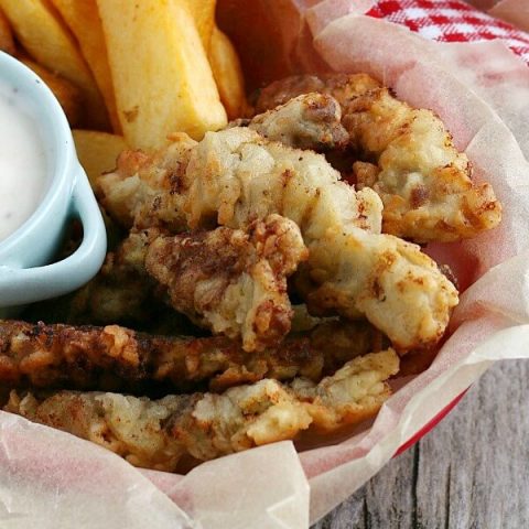closeup of steakfingers in basket with fries