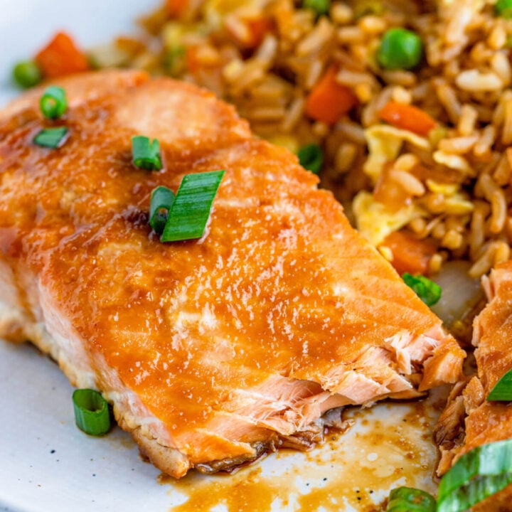 closeup of asian baked salmon with fried rice