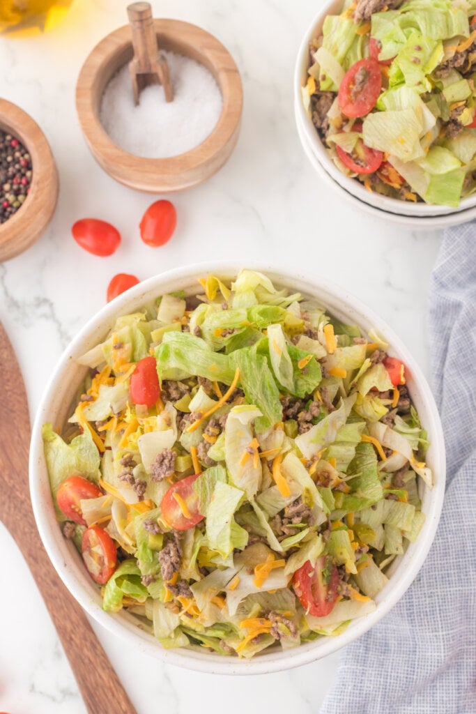 a bowl of big mac salad on table