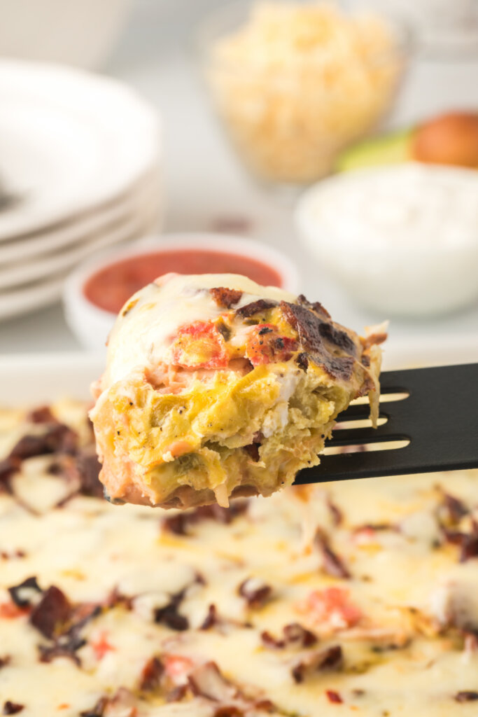 piece of mexican breakfast casserole on spatula