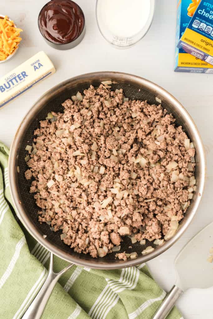 cooked ground beef and onions browned in a skillet for BBQ Beefy Mac and Cheese