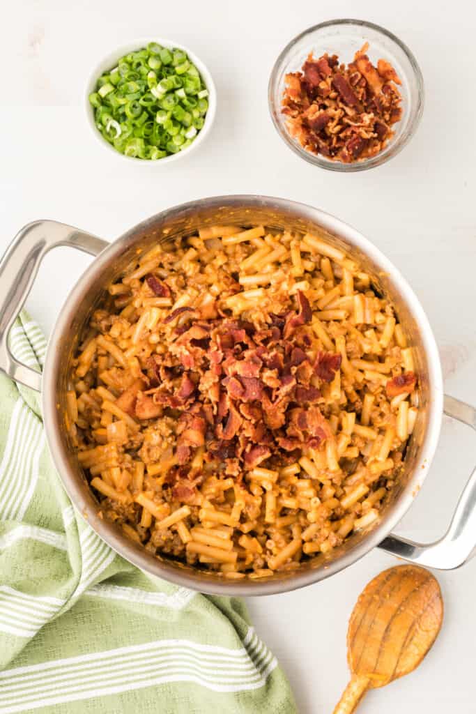 BBQ Beefy Mac and Cheese topped with bacon in a pot