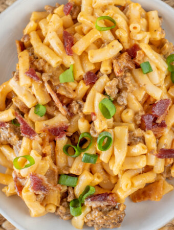 closeup looking down into bowl with beefy bbq mac and cheese