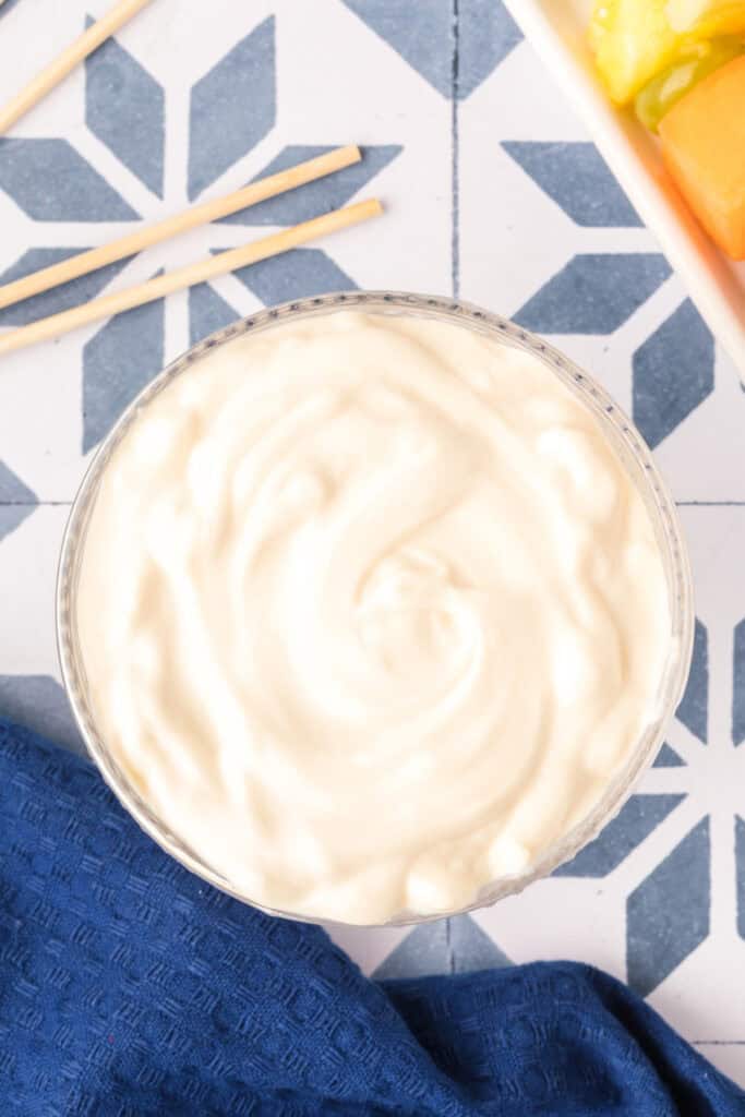 Bowl of creamy yogurt dip for Breakfast Kabobs and Mini Pancakes