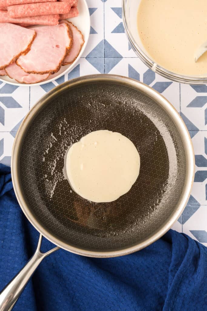 Mini pancake batter cooking in skillet for Breakfast Kabobs and Mini Pancakes