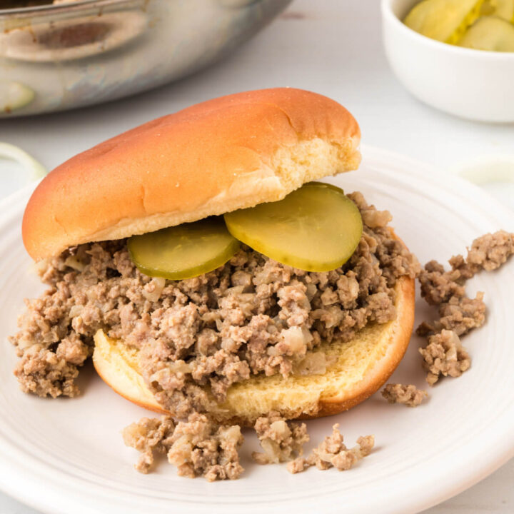 maid-rite sandwich with pickles on plate