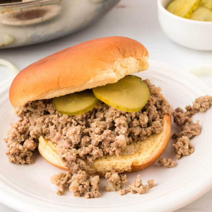 maid-rite sandwich with pickles on plate