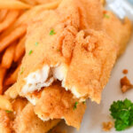 flaky fried fish fillet with fries