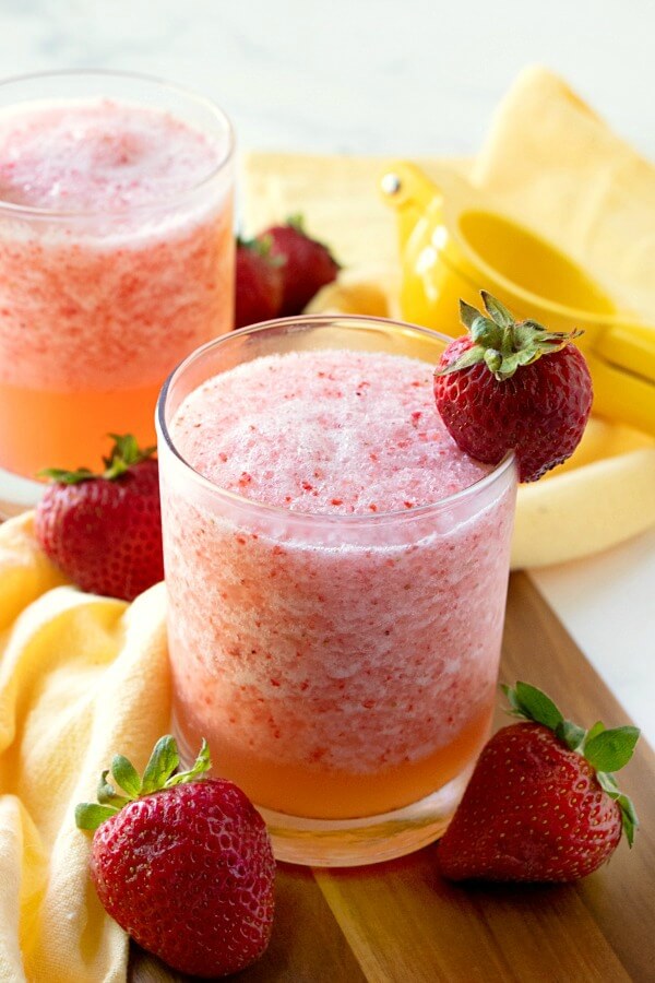 Two glasses lemon berry fruit slush