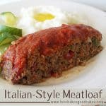 italian style meatloaf on white plate with cooked zucchini and mashed potatoes with butter