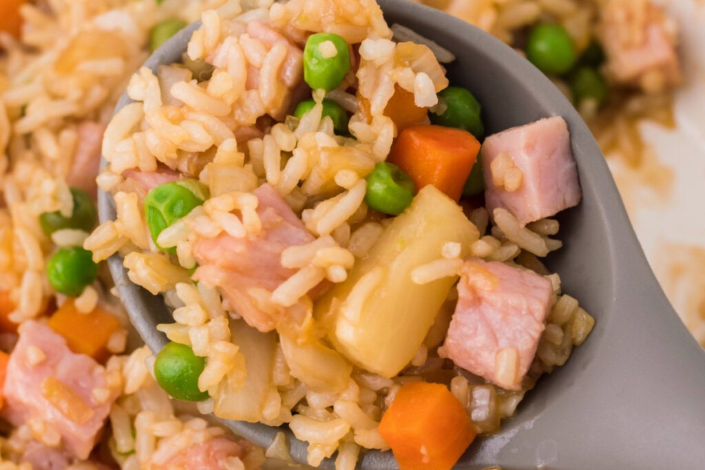 pineapple fried rice on spoon