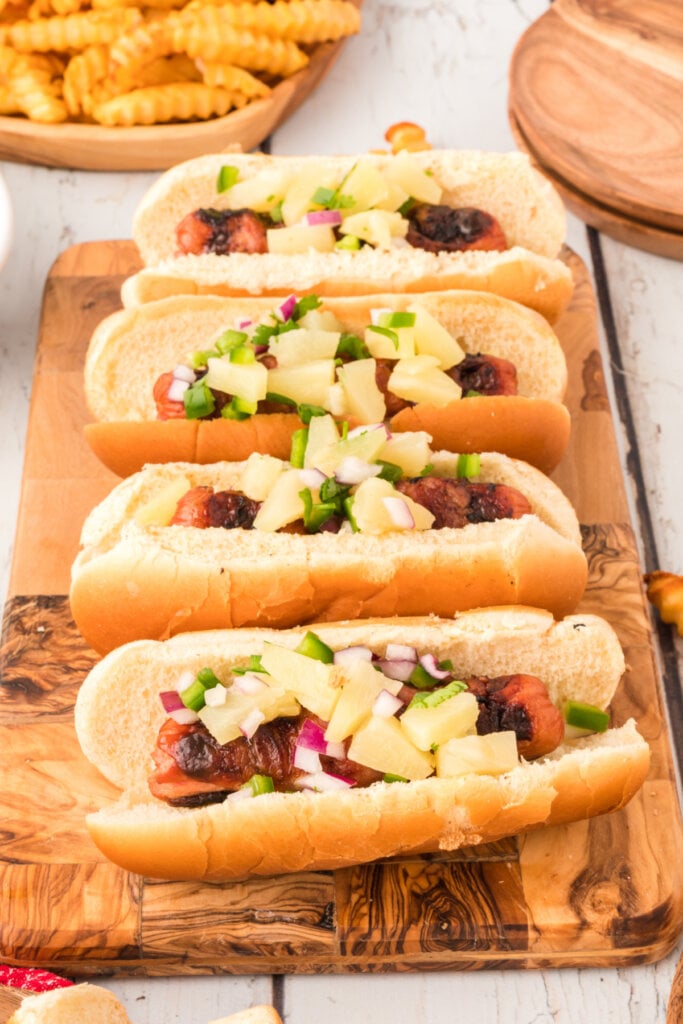 hot dogs on a cutting board