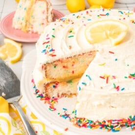 closeup of lemon funfetti cake with slice cut out