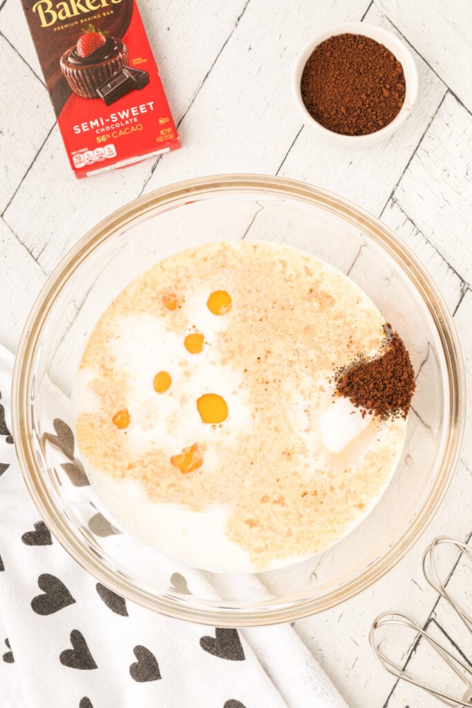 Ingredients for Cappuccino Crème Brûlée combined in a glass mixing bowl