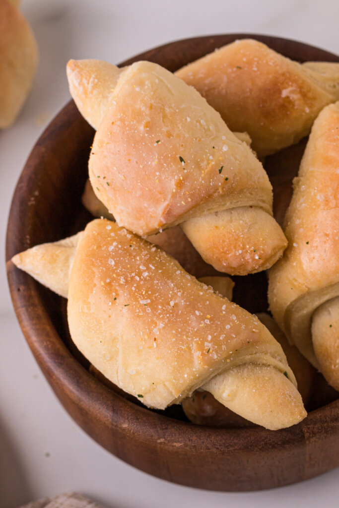 crescent rolls in wooden bowls