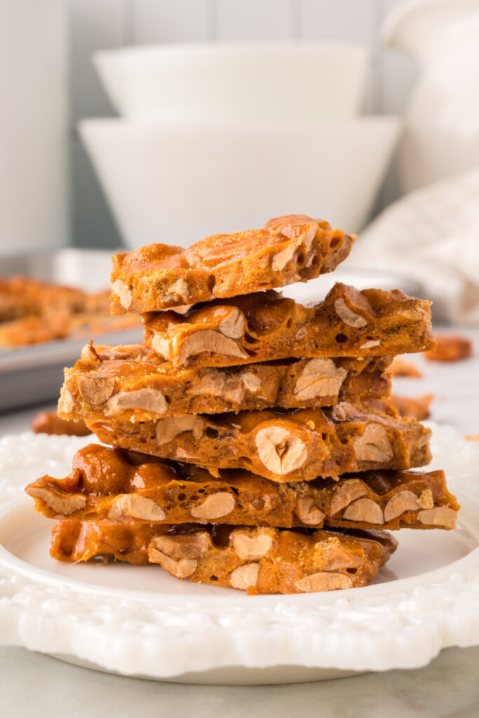peanut brittle stacked on a plate