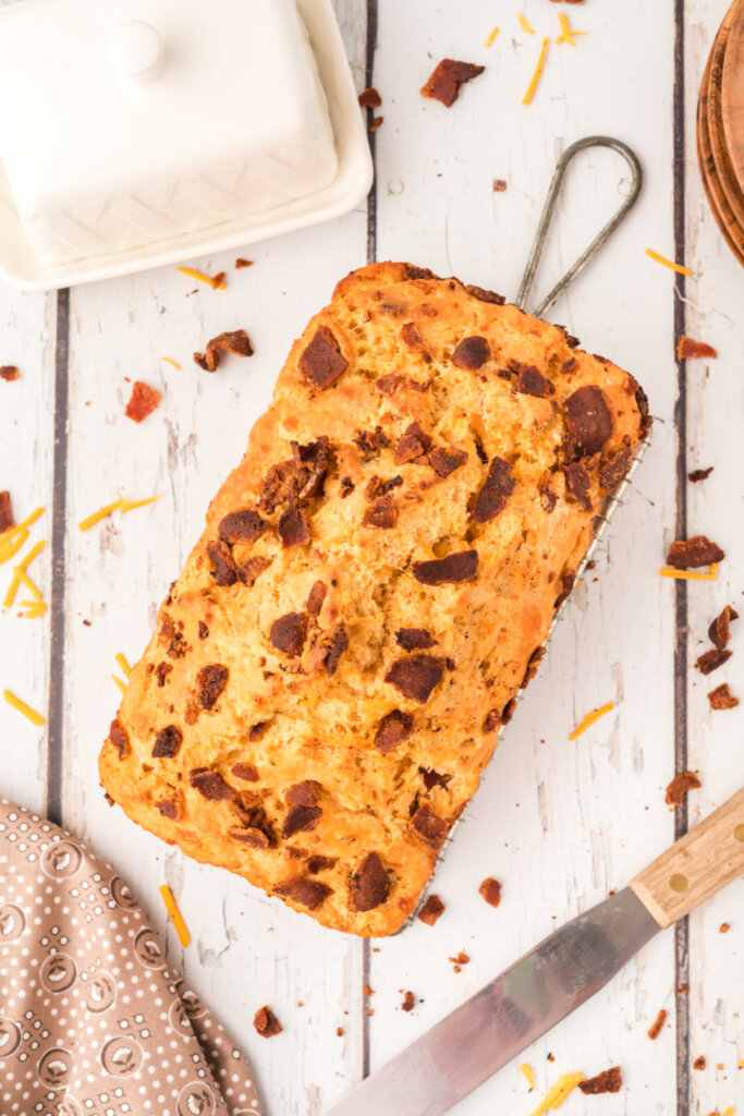 looking down on a loaf of finished bacon cheddar beer bread