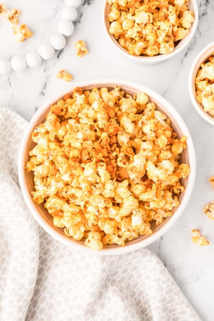 Buffalo Ranch Popcorn in a serving bowl for game-day snacks and movie nights