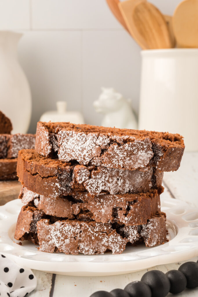 slices of chocolate pound cake stacked on plate