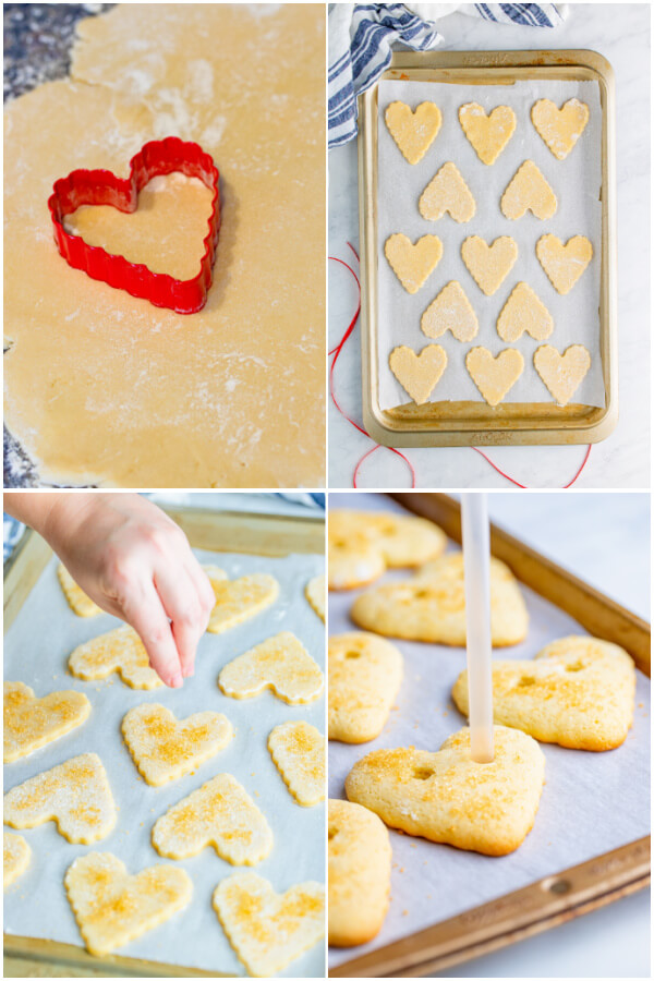 Cutting out cookies on a cookie sheet.