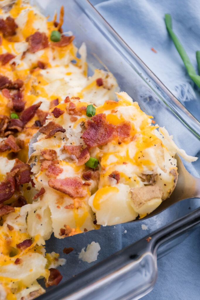 twice baked potato casserole in glass baking dish