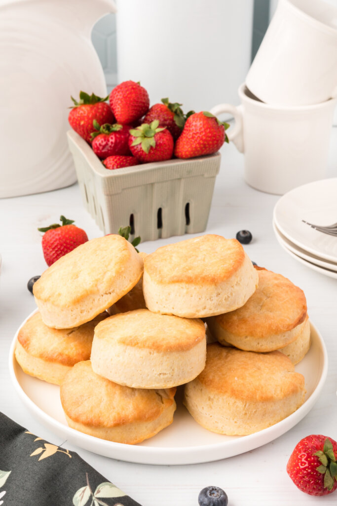 buttermilk biscuits stacked on plate