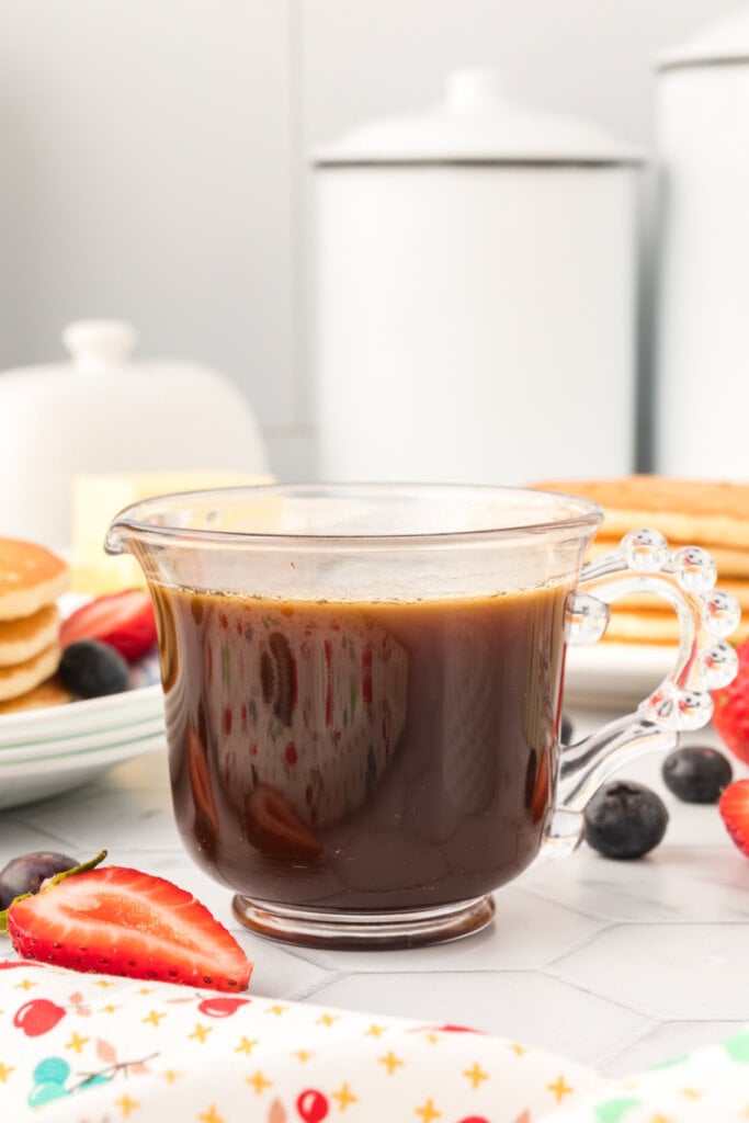 glass container with homemade vanilla pancake syrup