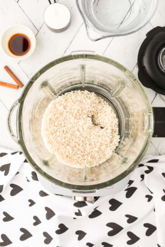 Place the rice in a blender. Cover the blender with a lid and blend until the rice is in very small pieces. 